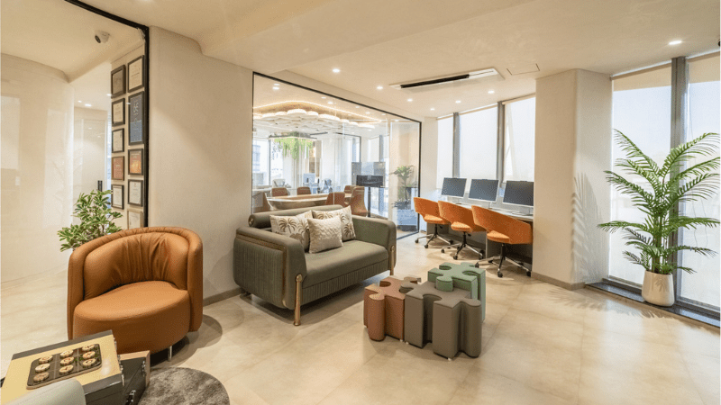 Architectural photography in Pune showcasing a luxury interior design with elegant lighting and detailed structure.