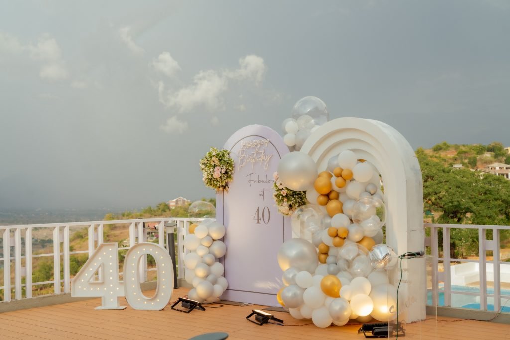Birthday celebration photography in Lonavala featuring cake cutting, family moments, and elegant event coverage.