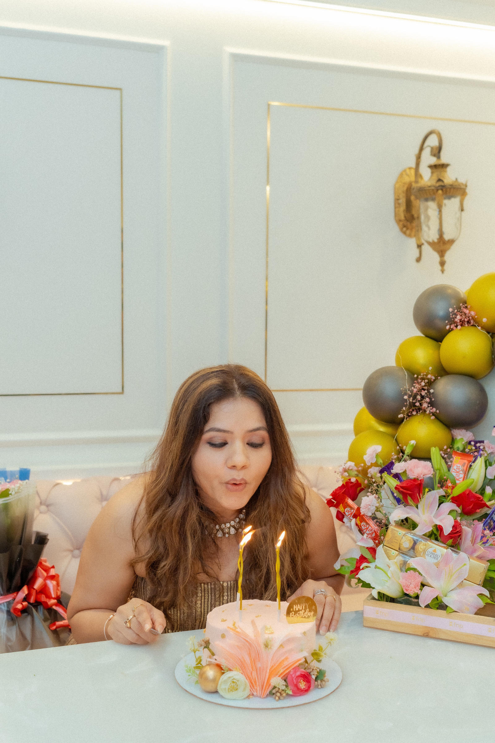 Golden hour luxury birthday photoshoot in Lonavala with warm natural light and timeless outdoor portraits.