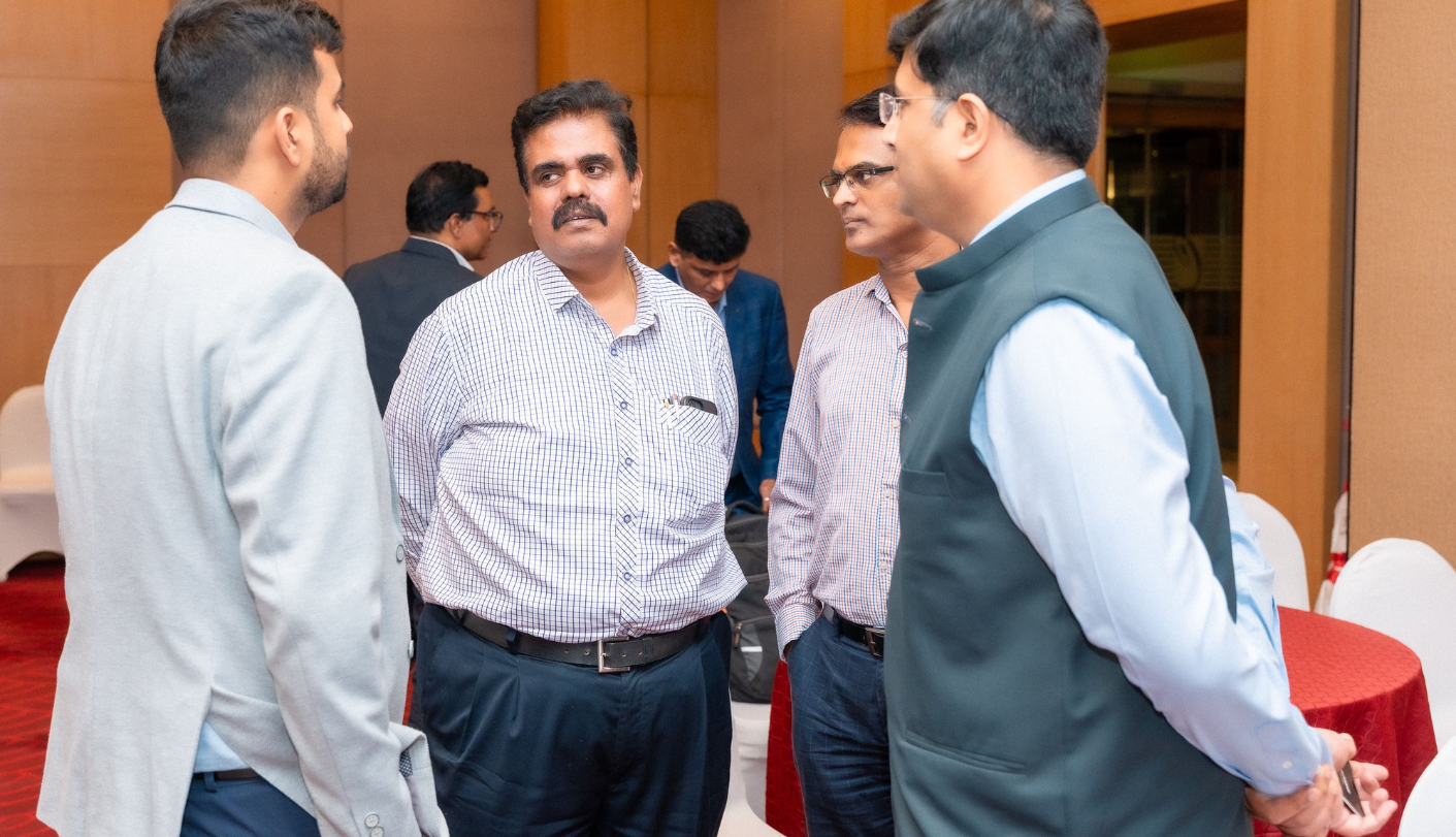 Corporate event photography in Mumbai during a group photo at Radisson