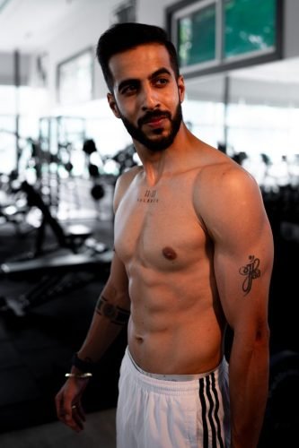 Body transformation photoshoot by professional photographer in Pune.