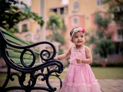 Cake smash photography in Pune — messy and joyful 1st birthday baby girl session