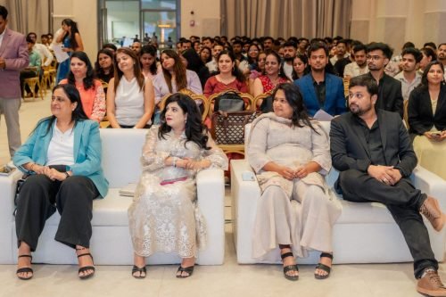 Conference photographer in Mumbai shooting a panel discussion