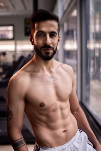 Intense gym workout session shot by photographer in Pune.