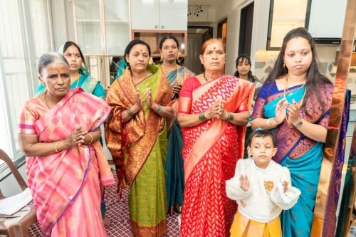 Housewarming photoshoot pune — couple entering dream home by Nestled Photography Baner