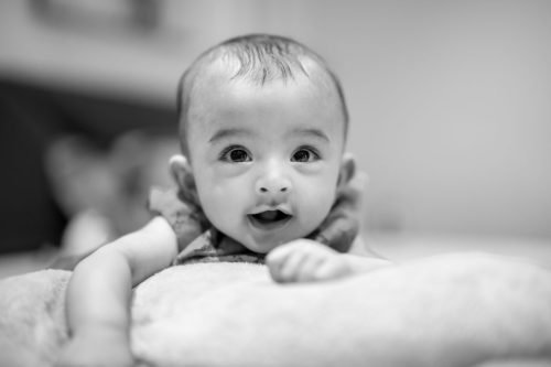 Candid baby shoot capturing pure joy at our studio in Baner.