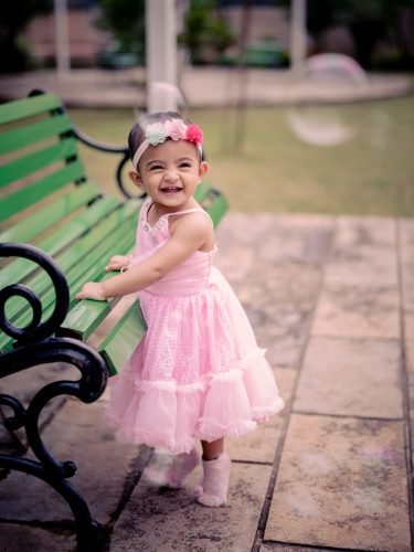 Indoor baby girl photoshoot in Pune — soft lighting and cute props at Baner studio